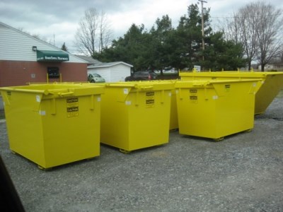 Several commercial waste containers